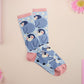 Cute knitted cotton crew socks with a cute baby emperor penguin design.