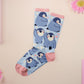 Cute knitted cotton crew socks with a cute baby emperor penguin design.