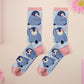 Cute knitted cotton crew socks with a cute baby emperor penguin design.