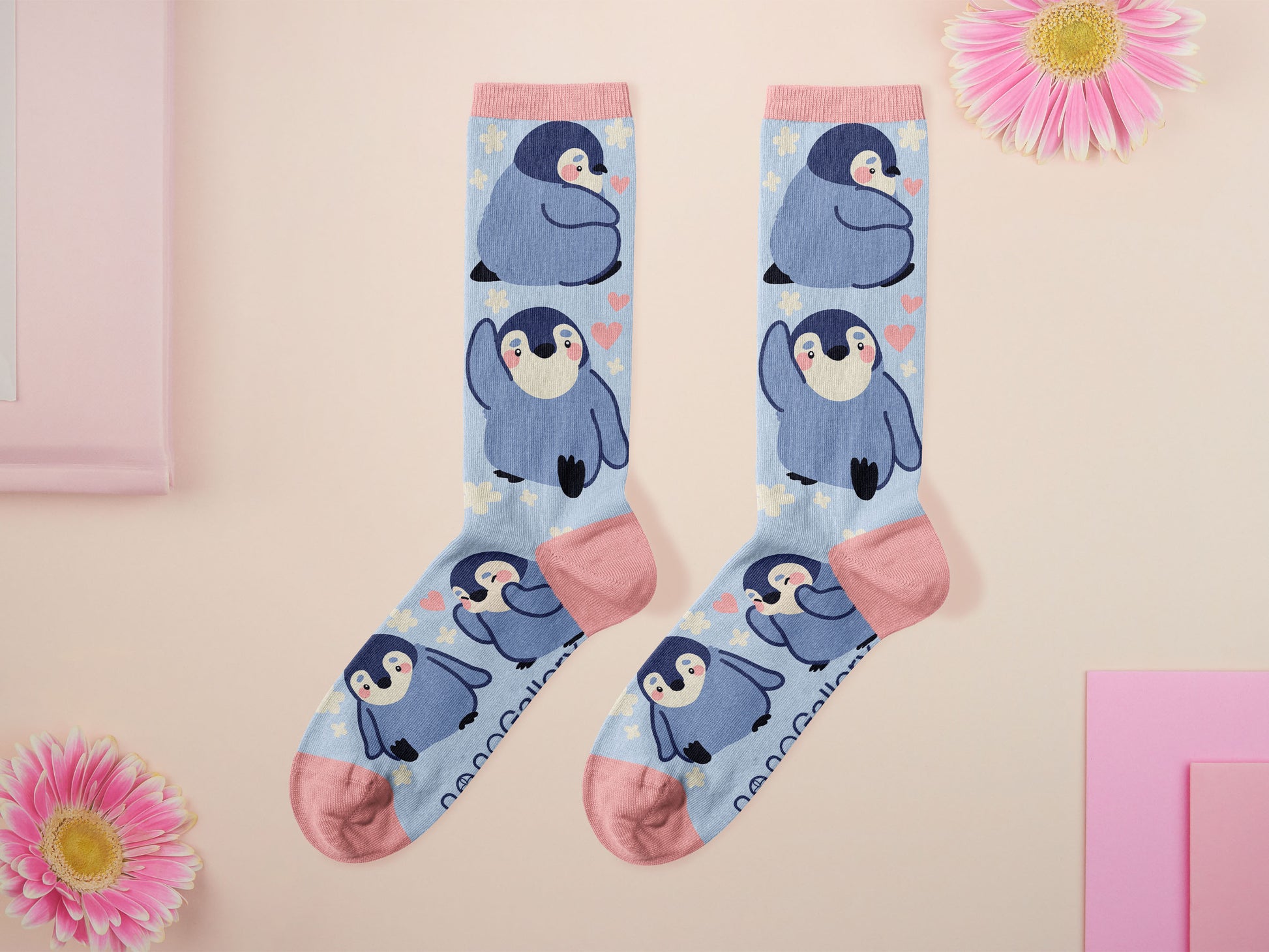 Cute knitted cotton crew socks with a cute baby emperor penguin design.