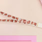 Cute full legth white lanyard with a double sided baby pygmy hippo Moo Deng pattern and silver swivel hook clasp.