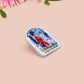 Clear acrylic pin badge with pink heart-shaped rubber pin back clasp. The design of the pin badge is a cute cartoon chibi fresno nightcrawlers, yeti bigfoot and alien UFO in a forest with the quote Be The Cryptid You Want To See In The Woods.