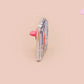 Clear acrylic pin badge with pink heart-shaped rubber pin back clasp. The design of the pin badge is a cute cartoon chibi fresno nightcrawlers, yeti bigfoot and alien UFO in a forest with the quote Be The Cryptid You Want To See In The Woods.