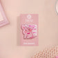A cute transparent acrylic pin badge with a pink heart-shaped rubber clasp pin back of a chibi bunny rabbit crying with the text Bestie I am at my limit