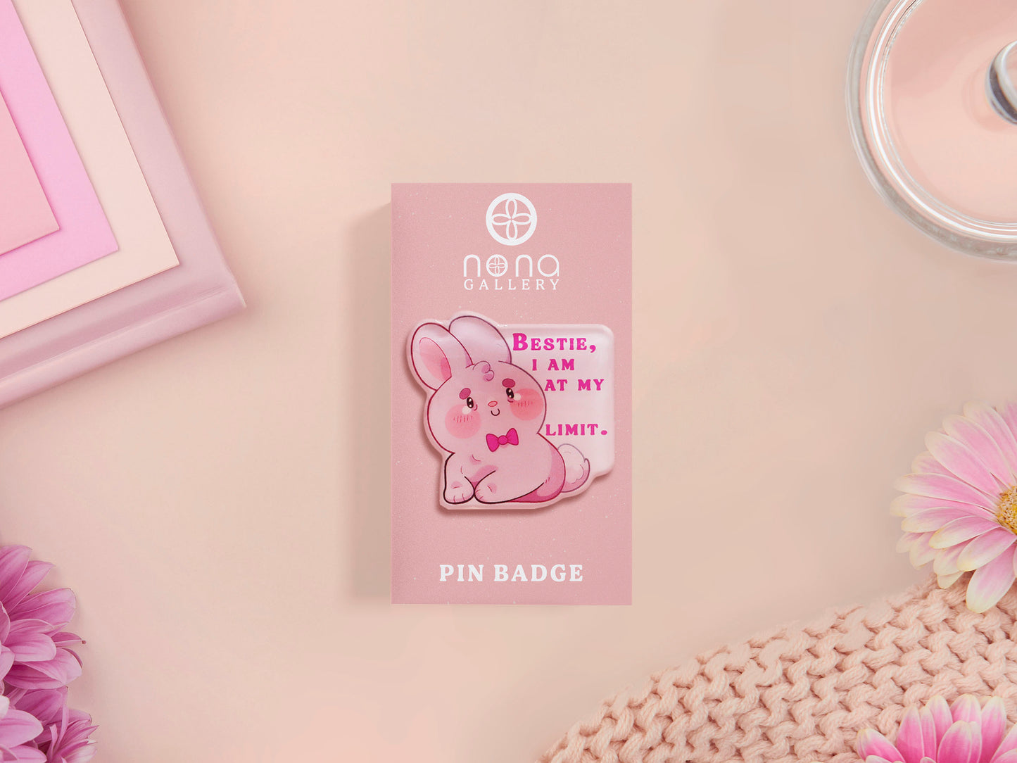 A cute transparent acrylic pin badge with a pink heart-shaped rubber clasp pin back of a chibi bunny rabbit crying with the text Bestie I am at my limit