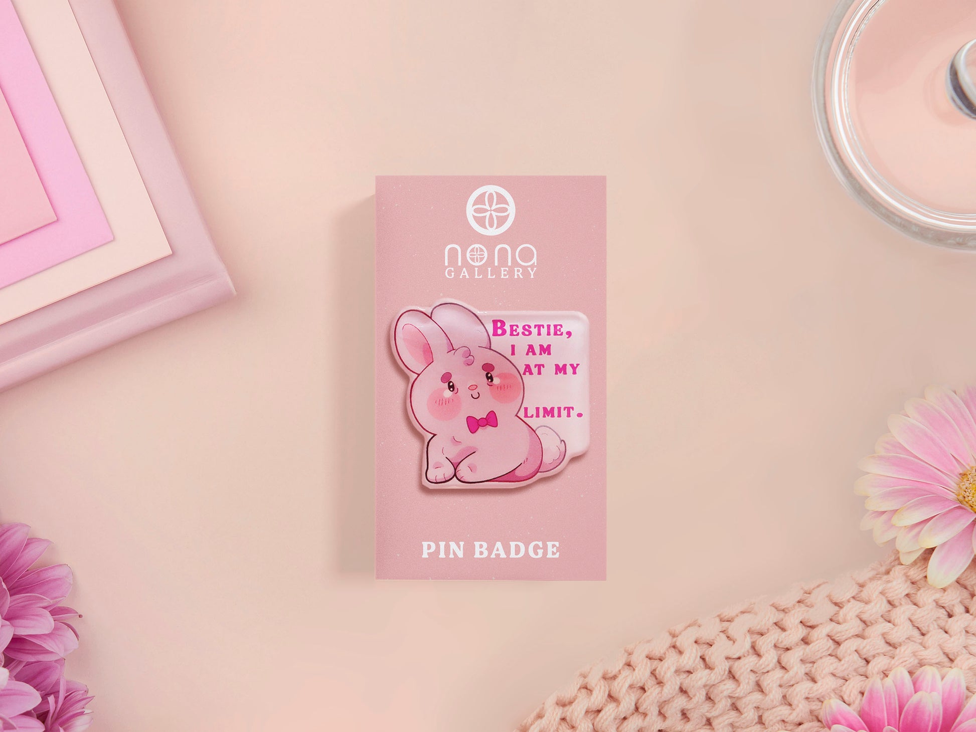 A cute transparent acrylic pin badge with a pink heart-shaped rubber clasp pin back of a chibi bunny rabbit crying with the text Bestie I am at my limit
