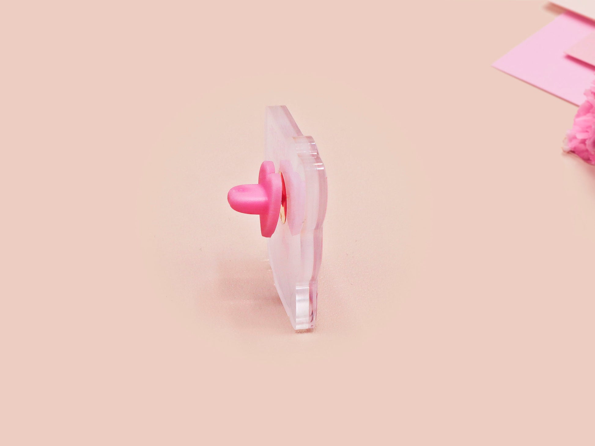 A cute transparent acrylic pin badge with a pink heart-shaped rubber clasp pin back of a chibi bunny rabbit crying with the text Bestie I am at my limit