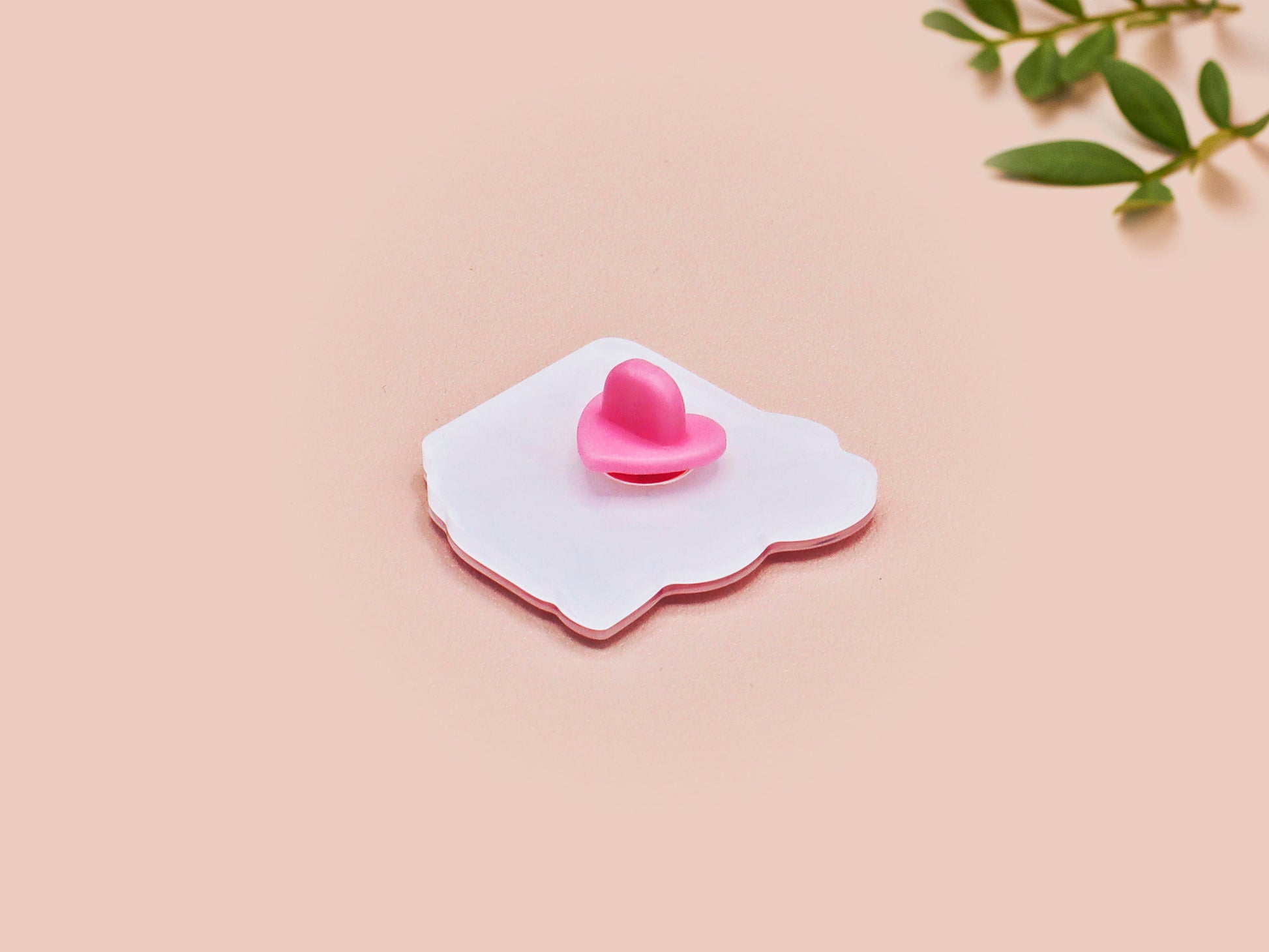 A cute transparent acrylic pin badge with a pink heart-shaped rubber clasp pin back of a chibi bunny rabbit crying with the text Bestie I am at my limit