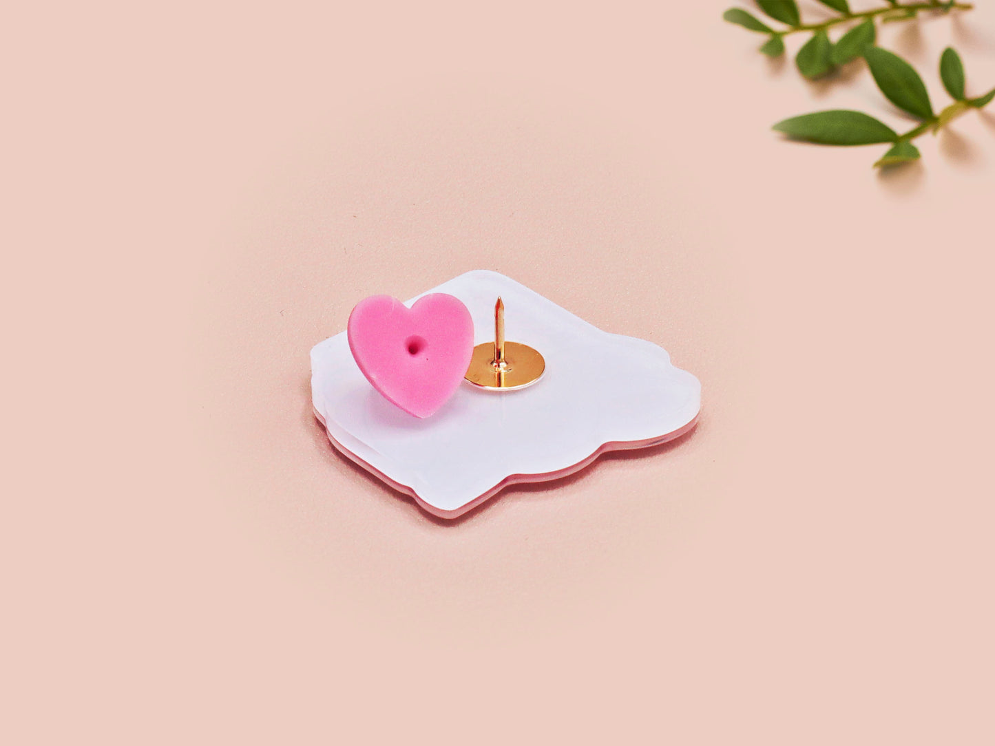 A cute transparent acrylic pin badge with a pink heart-shaped rubber clasp pin back of a chibi bunny rabbit crying with the text Bestie I am at my limit