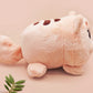 An adorable fluffy cat plushie toy with cute embroidered eyes, facial expression and applique stripes and pawprint toe beans, with a hang tag describing the cat as Brenda.