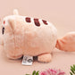 An adorable fluffy cat plushie toy with cute embroidered eyes, facial expression and applique stripes and pawprint toe beans, with a hang tag describing the cat as Brenda.