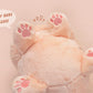 An adorable fluffy cat plushie toy with cute embroidered eyes, facial expression and applique stripes and pawprint toe beans, with a hang tag describing the cat as Brenda.