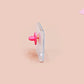 A clear acrylic pin badge with a pink heart-shaped pin back clasp. The design of the pin badge is of a cute chibi blue fish with the quote buy a man eat fish he day teach fish man to a lifetime.