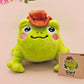 An adorable green frog plushie toy with cute embroidered eyes and facial expression, wearing a cowboy hat with a brown ribbon, and a hang tag describing the frog as Carl.