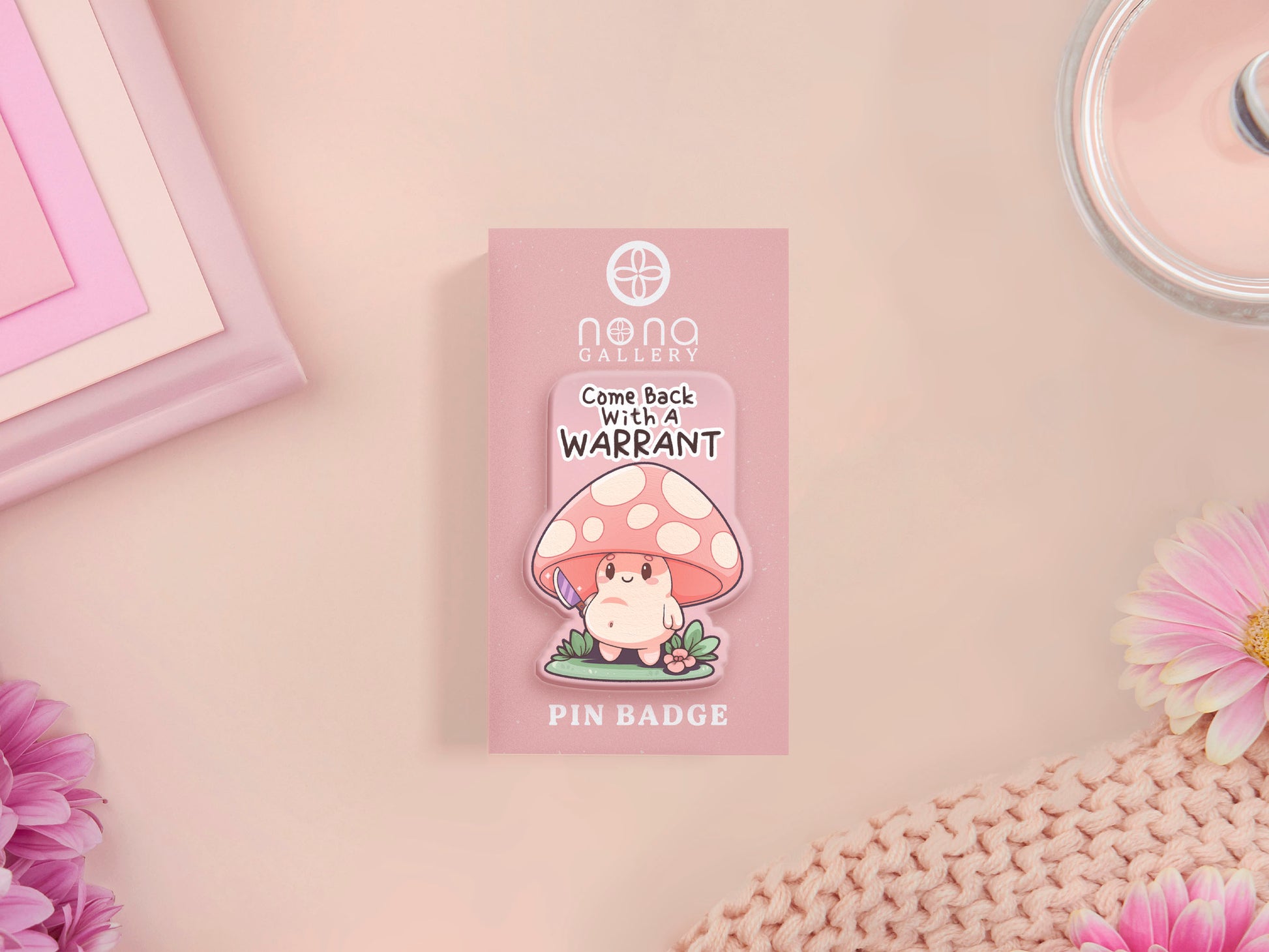 This cute transparent acrylic pin badge has a pink rubber heart shrimp pin-back clasp. The design is of a chibi cartoon mushroom with the text "Come back with a warrant."