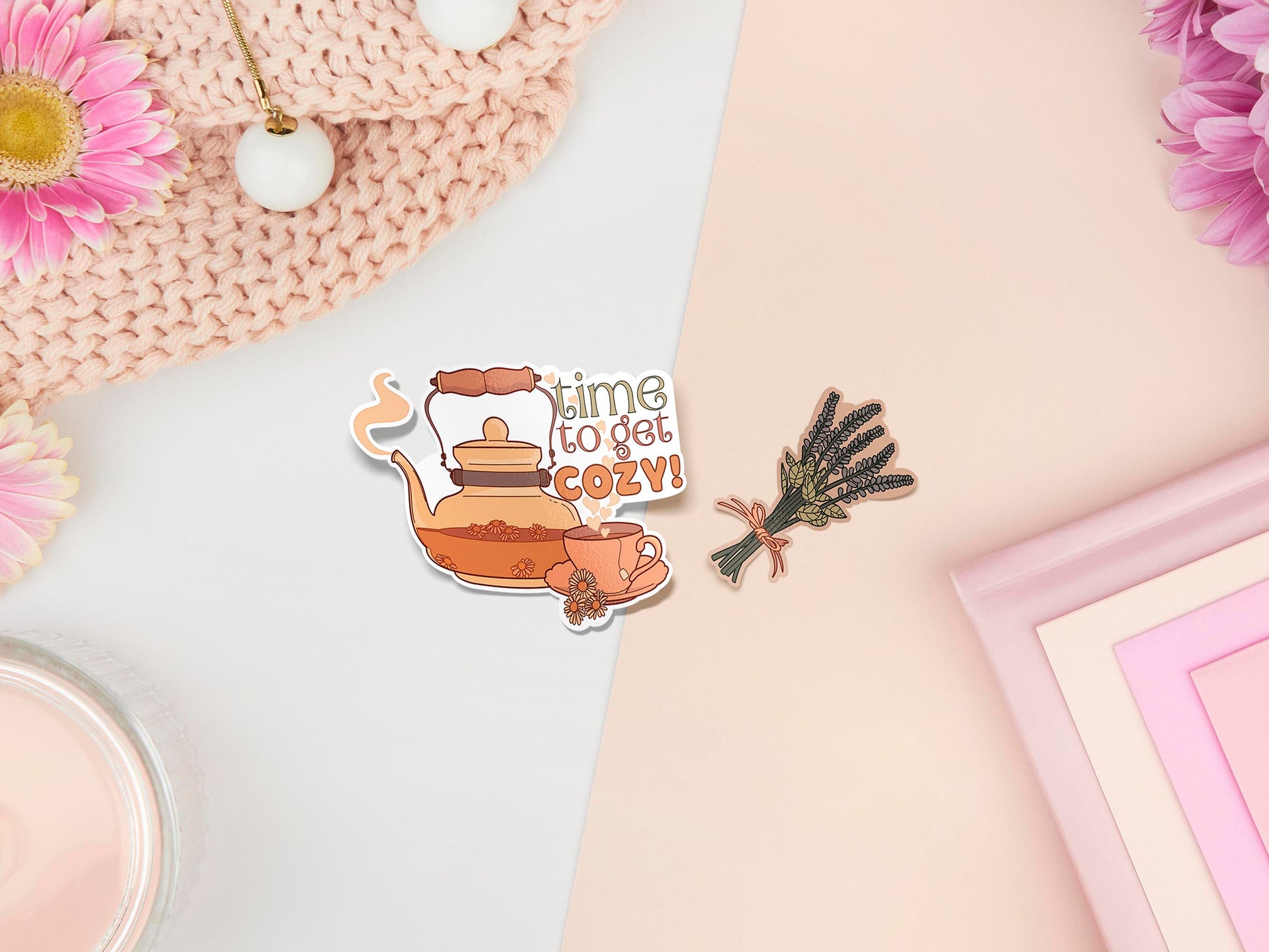 Two stickers of digital illustration cartoons, one is a transparent kettle with floral tea and cup with the words time to get cozy! and the other is a bunch of lavender tied with a bow 