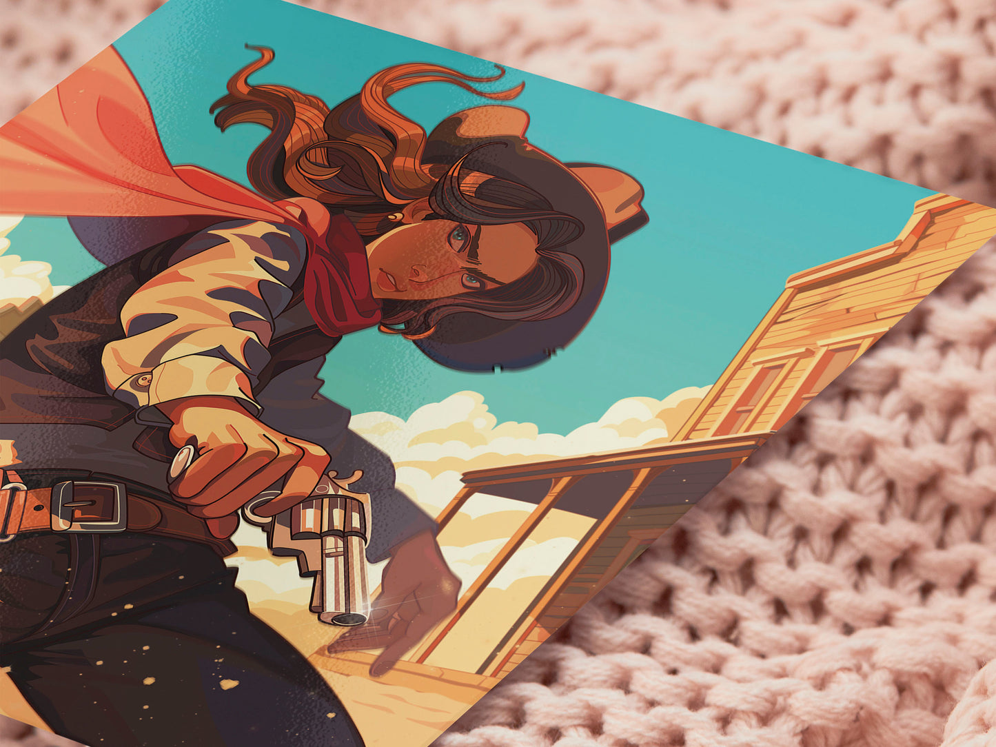 A square art print depicting a cowgirl gunslinger in a dramatic pose in the wild west outside a saloon.