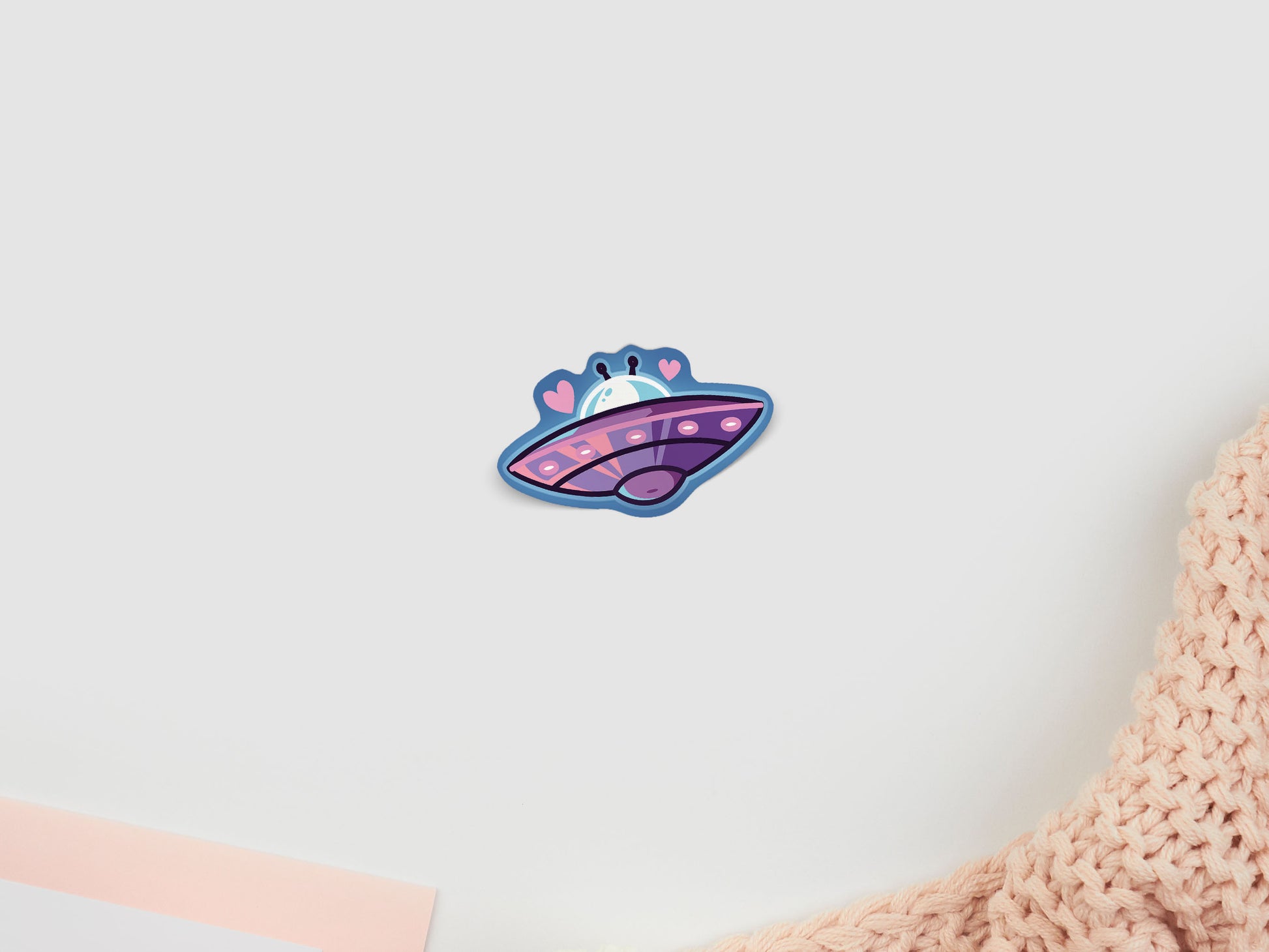 A cute gloss vinyl waterproof sticker of an alien ufo spaceship