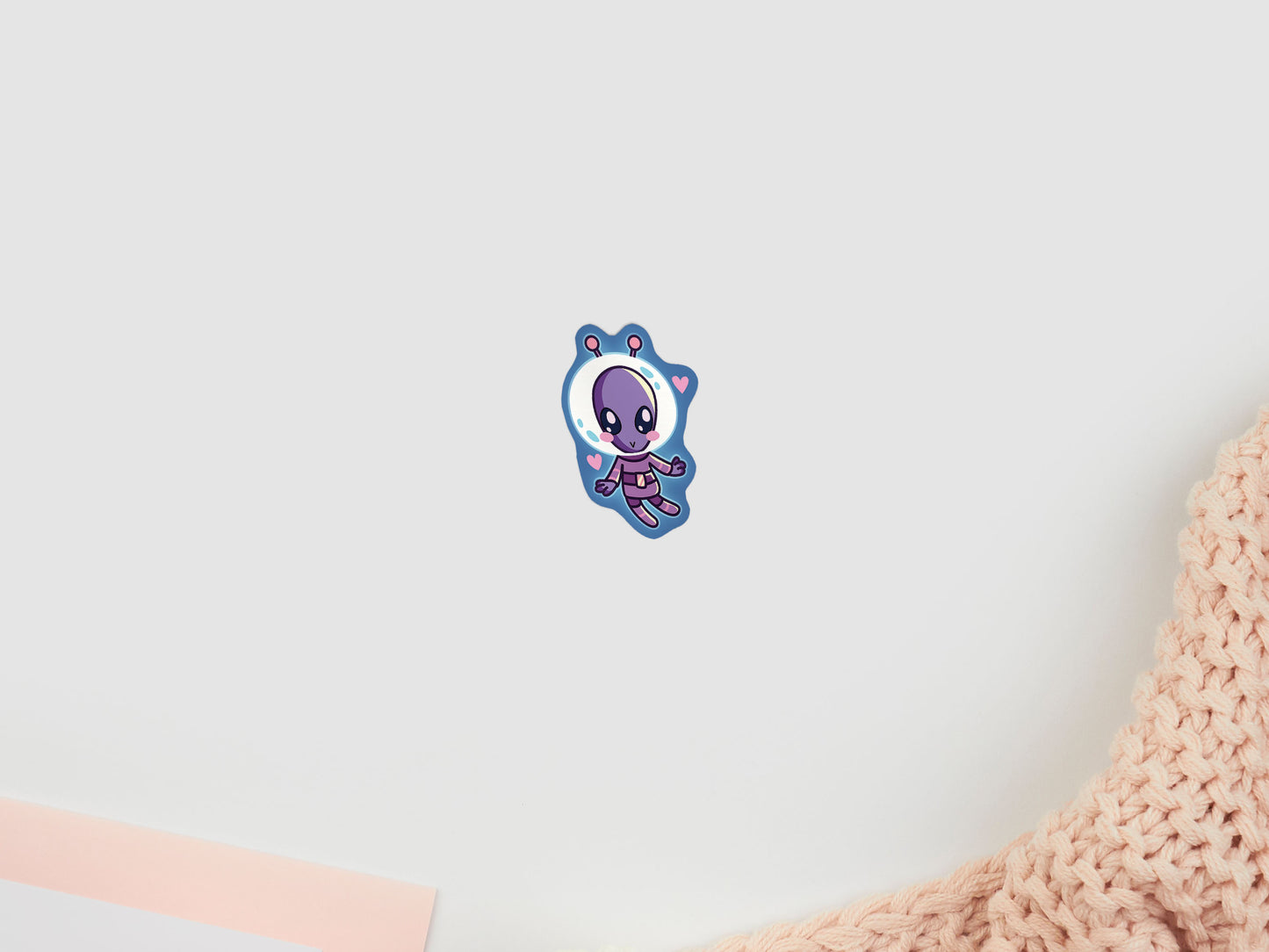 A cute gloss vinyl waterproof sticker of an alien