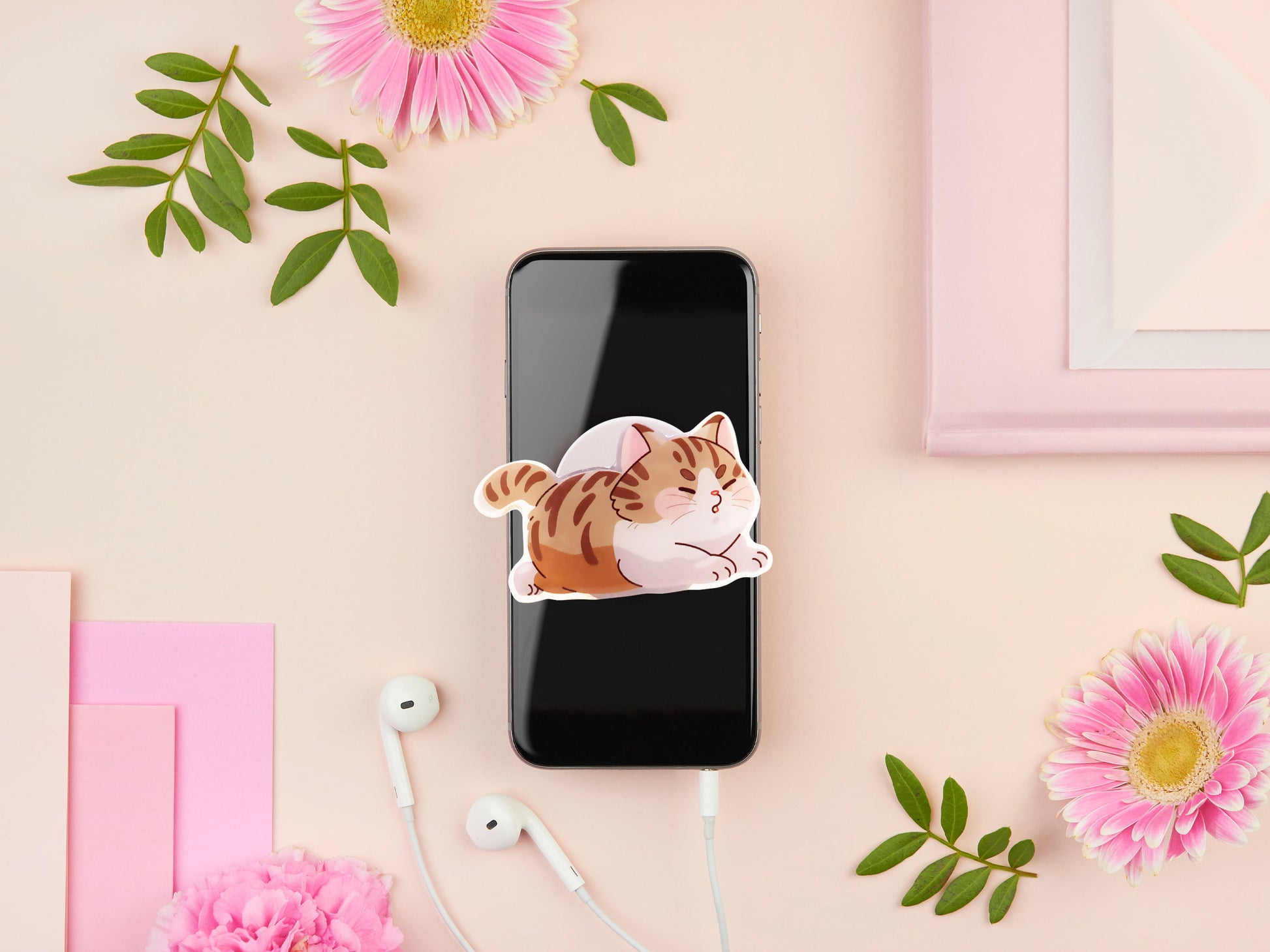 Cute acrylic popsocket phone grip of a stretching tabby cat kitten