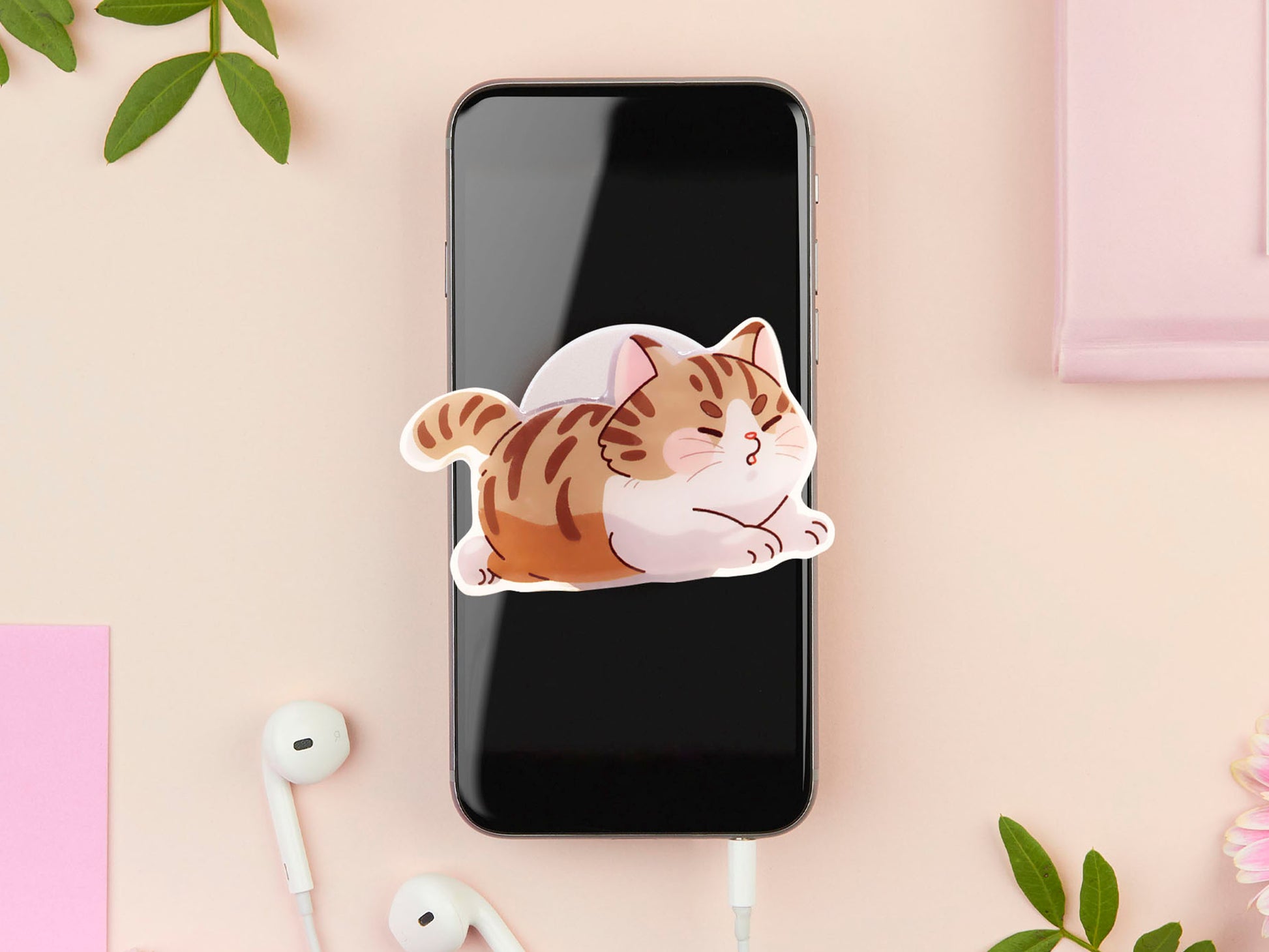 Cute acrylic popsocket phone grip of a stretching tabby cat kitten