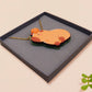 Adorable cute capybara with an orange on its head necklace made of wood and glitter pearlescent acrylic with a gold chain, displayed in a velvet gift box with a unique cute capybara sleeve design.