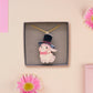 Adorable cute white bunny rabbit wearing a top hat and now tie necklace made of wood and mirror acrylic with a gold chain, displayed in a velvet gift box with a unique cute rabbit sleeve design.