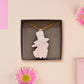 Adorable cute white bunny rabbit wearing a top hat and now tie necklace made of wood and mirror acrylic with a gold chain, displayed in a velvet gift box with a unique cute rabbit sleeve design.