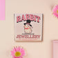 Adorable cute white bunny rabbit wearing a top hat and now tie necklace made of wood and mirror acrylic with a gold chain, displayed in a velvet gift box with a unique cute rabbit sleeve design.