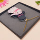 Adorable cute white bunny rabbit wearing a top hat and now tie necklace made of wood and mirror acrylic with a gold chain, displayed in a velvet gift box with a unique cute rabbit sleeve design.