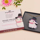 Adorable cute white bunny rabbit wearing a top hat and now tie necklace made of wood and mirror acrylic with a gold chain, displayed in a velvet gift box with a unique cute rabbit sleeve design.