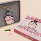 Adorable cute white bunny rabbit wearing a top hat and now tie necklace made of wood and mirror acrylic with a gold chain, displayed in a velvet gift box with a unique cute rabbit sleeve design.