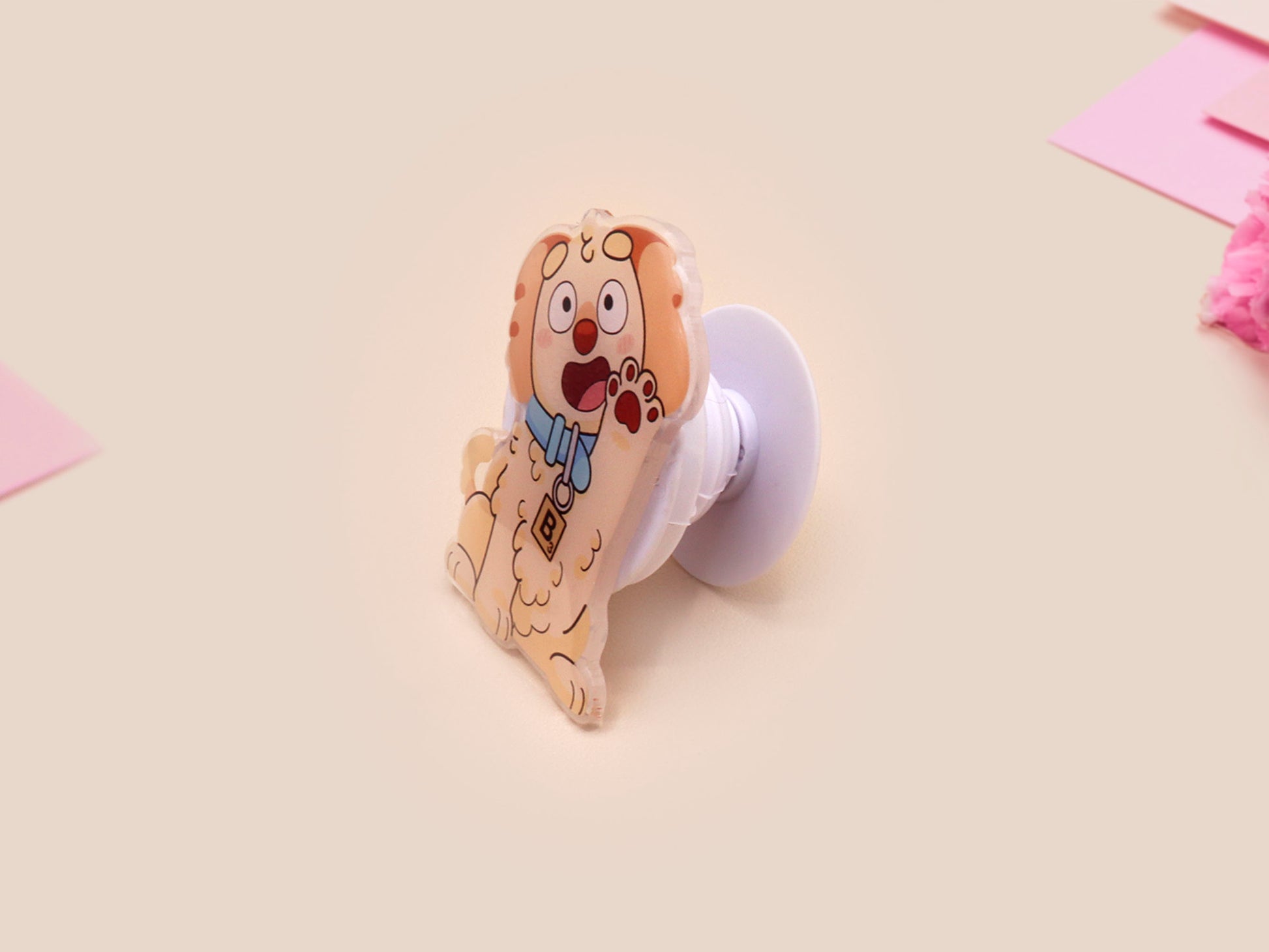 Cute acrylic popsocket phone grip of a waving puppy dog