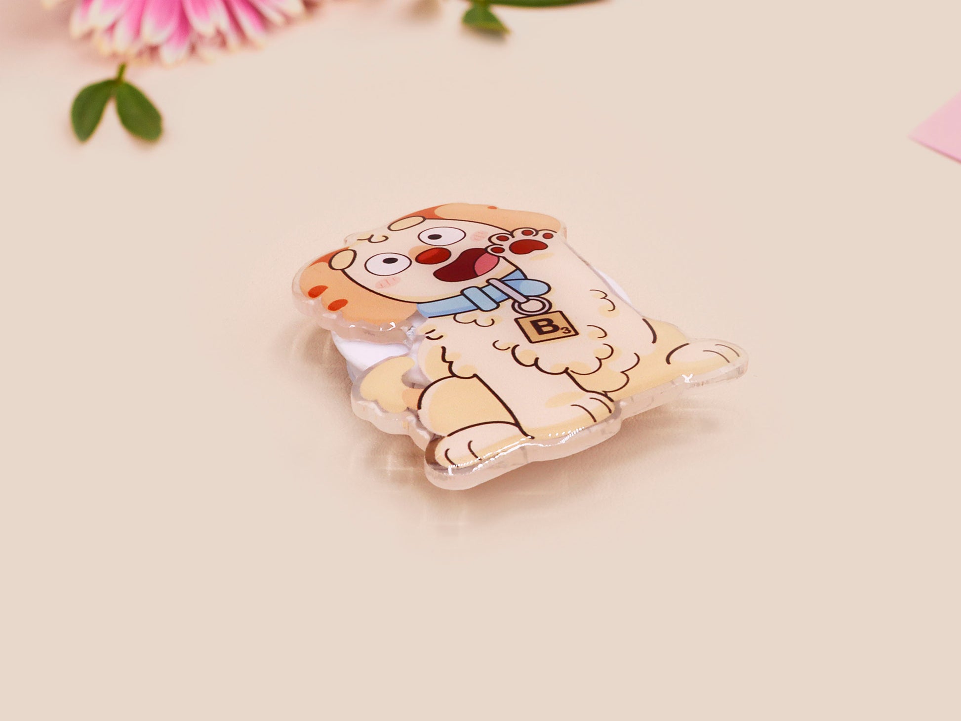 Cute acrylic popsocket phone grip of a waving puppy dog
