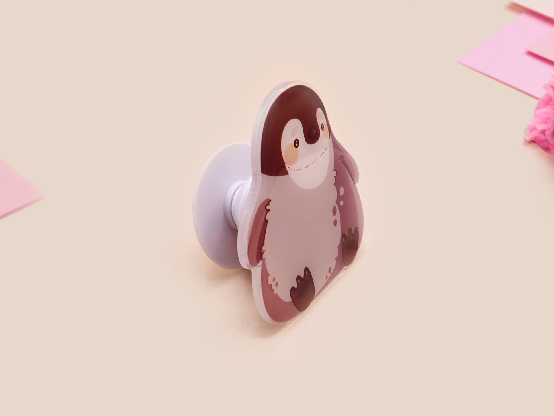 Cute popsocket phone grip with an adorable emperor penguin chick design