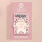 Cute transparent acrylic pin badge with a pink heart-shaped pin back clasp. The design of the badge is a chibi hench and buff cat with the quote Did you justPSPSPSPSPST my gurl?!