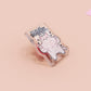 Cute transparent acrylic pin badge with a pink heart-shaped pin back clasp. The design of the badge is a chibi hench and buff cat with the quote Did you justPSPSPSPSPST my gurl?!