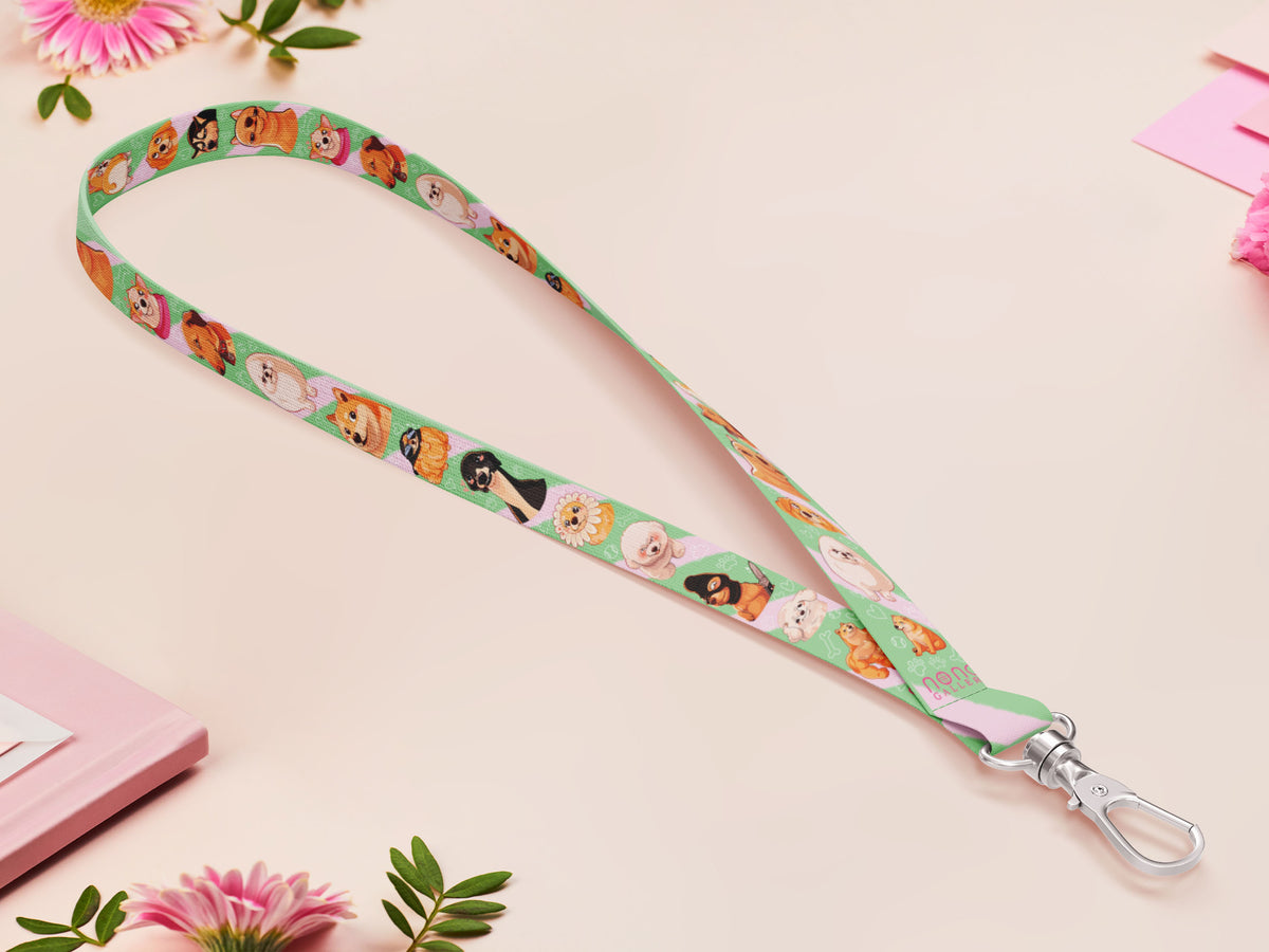 Cute full legth green lanyard with a double sided cute chibi dog meme pattern and silver swivel hook clasp.