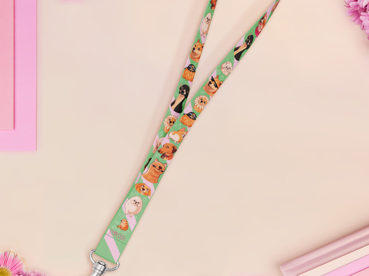 Cute full legth green lanyard with a double sided cute chibi dog meme pattern and silver swivel hook clasp.