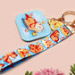 Acrylic epoxy blue capybara spa keychain with a large acrylic charm of a capybara floating in water relaxing with a face mask with the quote don't worry be cappy, a smaller charm of a cute rubber duck and a matching capybara spa day lanyard.