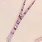 Cute full legth purple lanyard with a double sided funny screaming possums  pattern and silver swivel hook clasp.