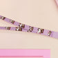 Cute full legth purple lanyard with a double sided funny screaming possums  pattern and silver swivel hook clasp.