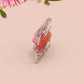 A cute transparent acrylic pin badge with a pink heart-shaped rubber clasp pin back. The design of the pin badge is a cartoon orange worm on a sting sitting on a sofa chaise lounge with the titanic quote Draw Me Like One of Your French Worms