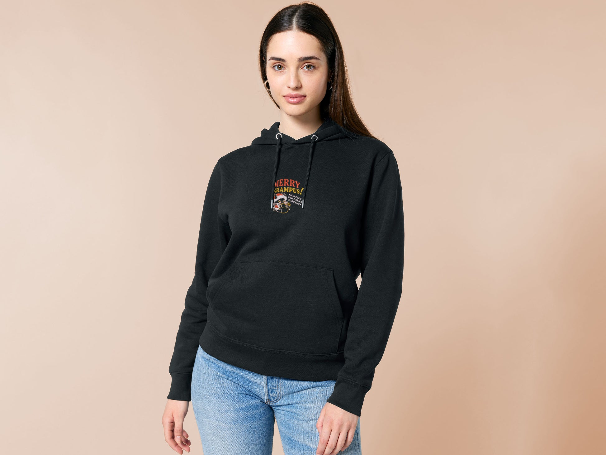 A black crew neck long sleeve hoodie, with an embroidered chibi krampus christmas demon holdign a sack and the quote Mery Krampus! Muffled Children's screams