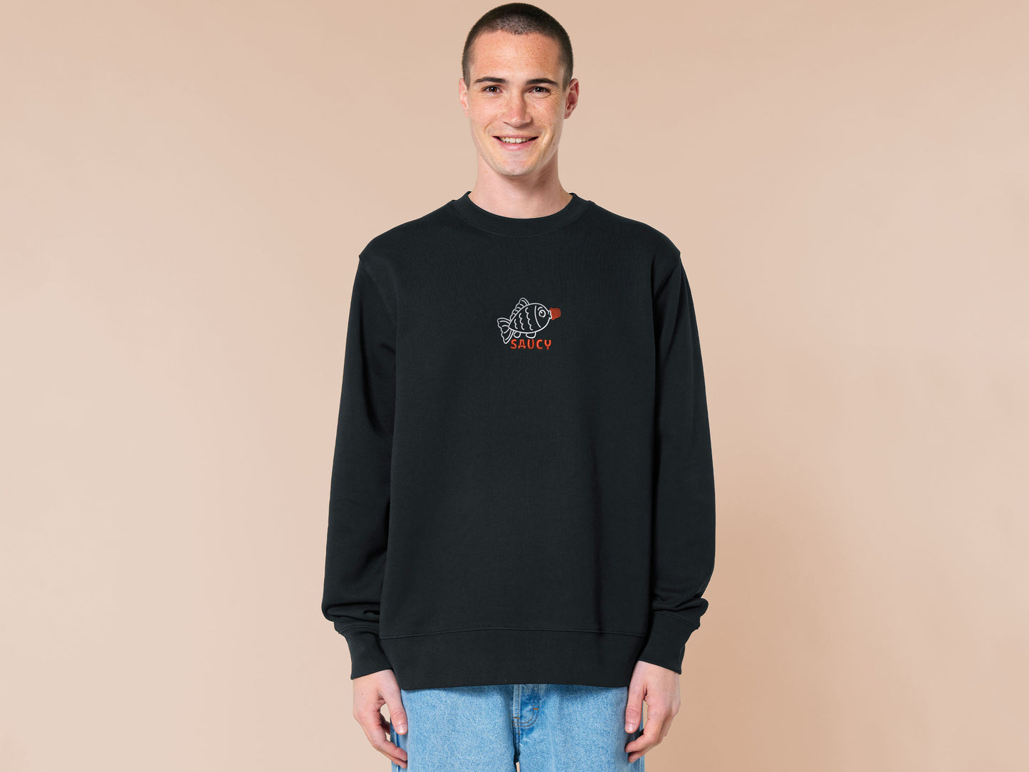 Embroidered black sweater with a cute chibi soy sauce fish bottle text suacy