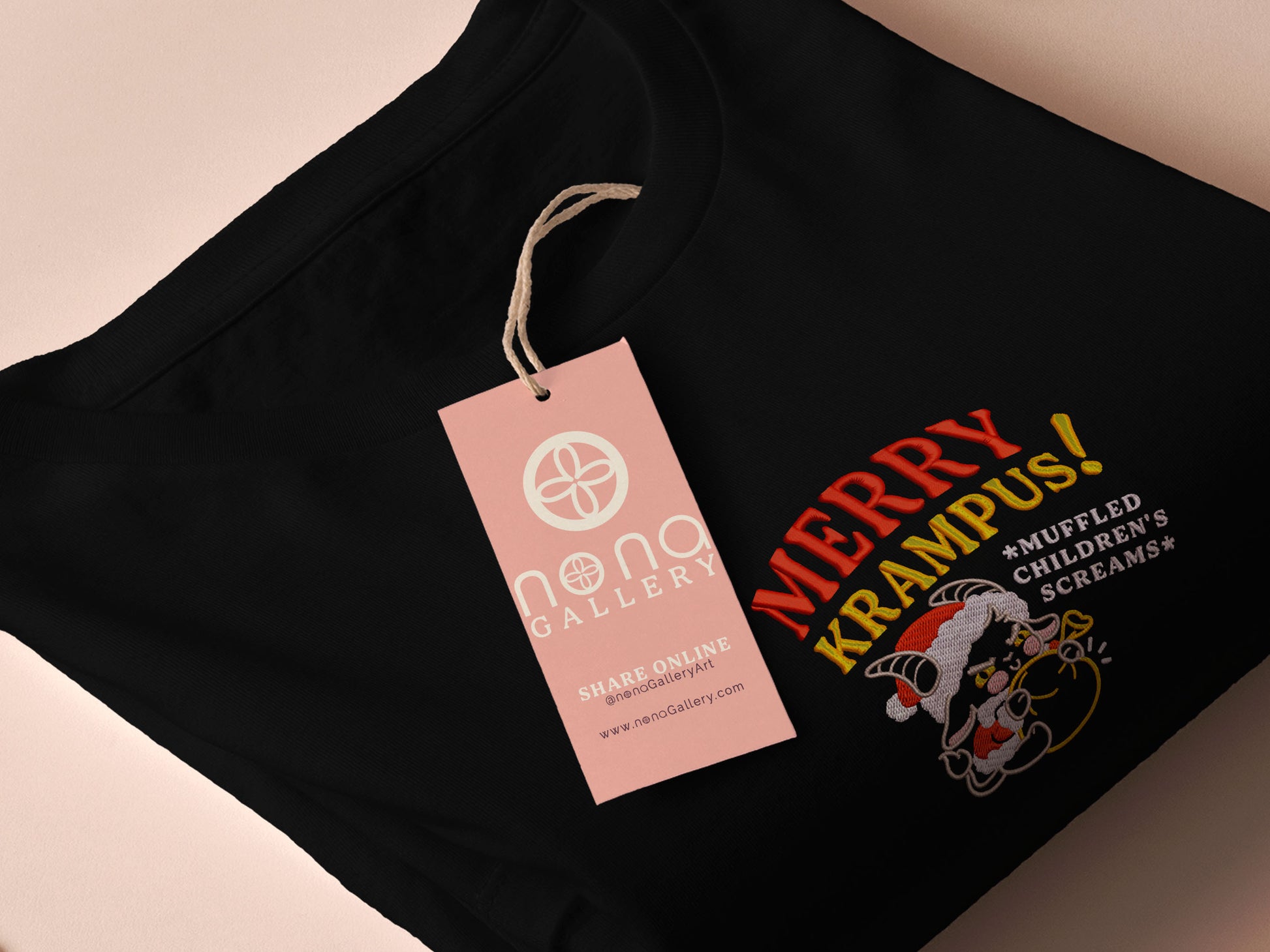 A black crew neck long sleeve sweater, with an embroidered chibi krampus christmas demon holdign a sack and the quote Mery Krampus! Muffled Children's screams