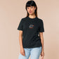 Embroidered black t-shirt with a cute chibi soy sauce fish bottle text suacy
