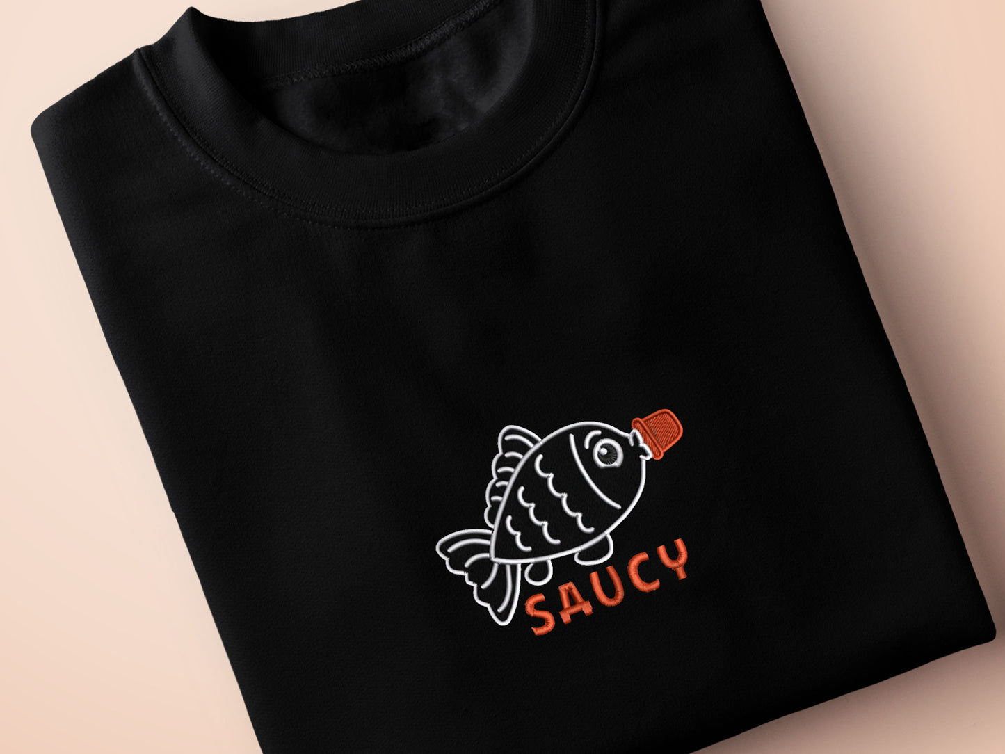 Embroidered black t-shirt with a cute chibi soy sauce fish bottle text suacy