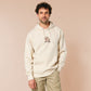 A cream crew neck long sleeve hoodie, with an embroidered design of a cute shiba inu dog looking stressed surrounded by the quote Let Me Just Overthink This