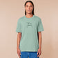 An embroidered green t-shirt design of a funny cartoon frog with the text a concern.